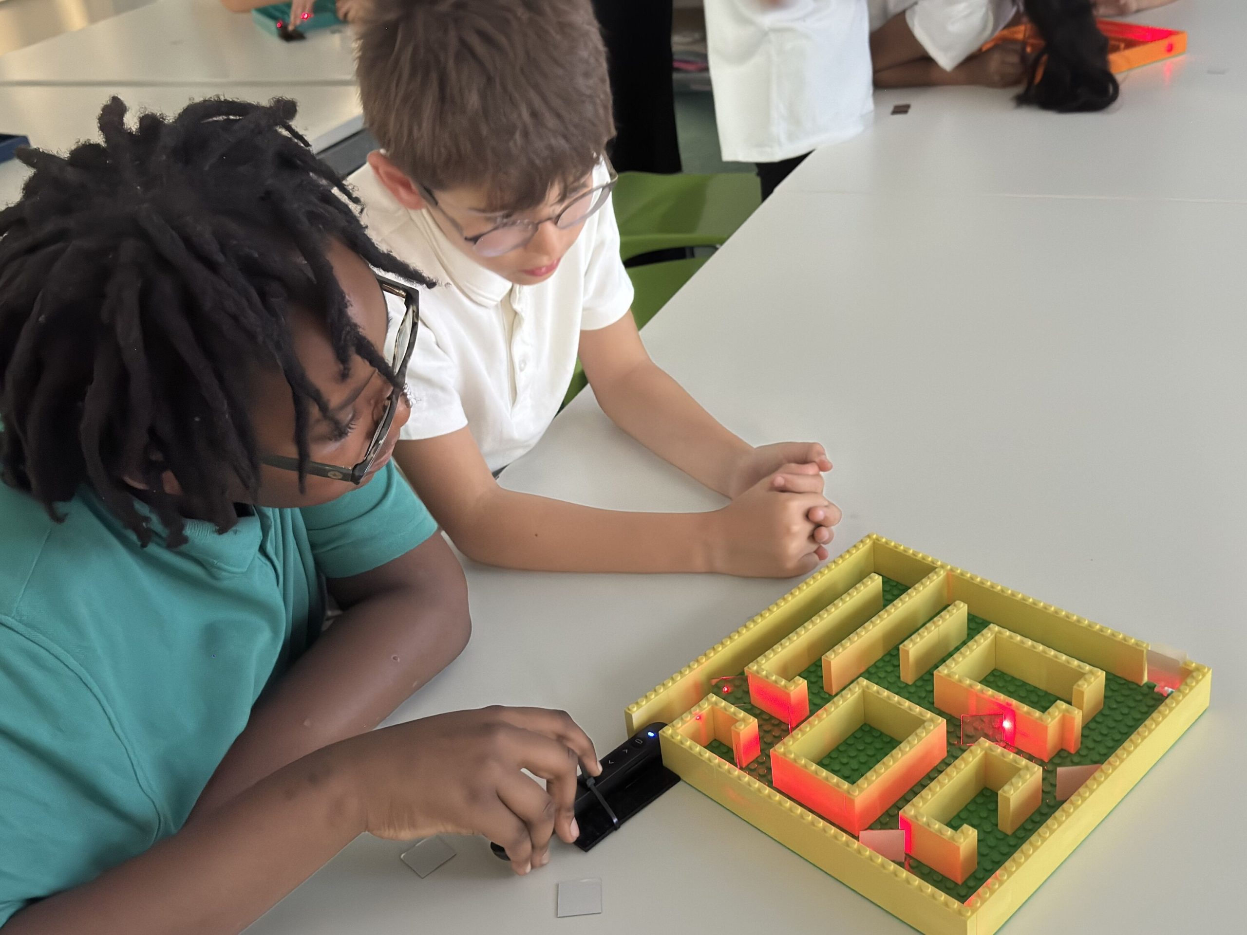 Pupils building a laser maze at Barton Primary School
